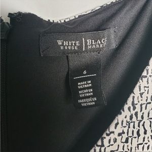 Beautiful dress perfect for work attire or social gathering. No rips or stains.